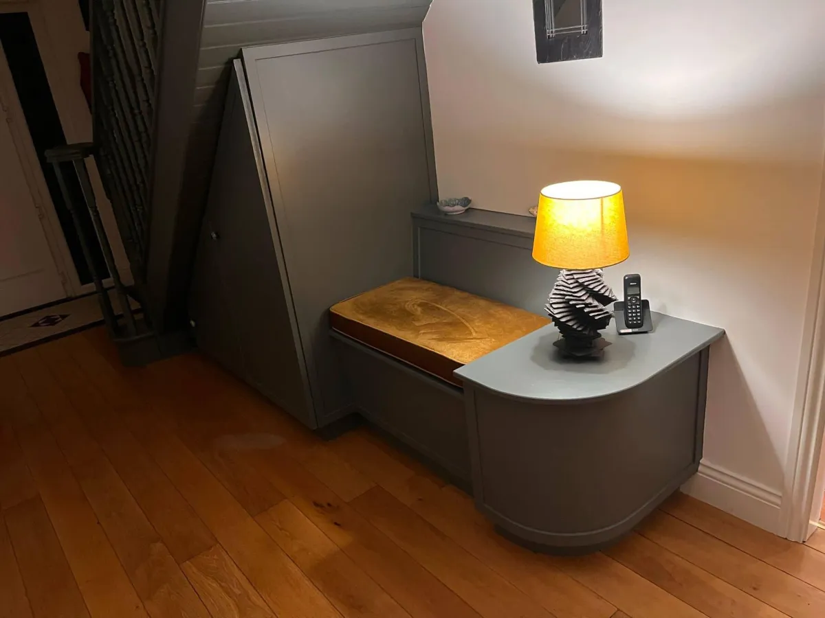 Understair storage nook, finished, with lamp
